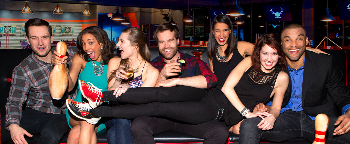 woman lying down on group of friends
