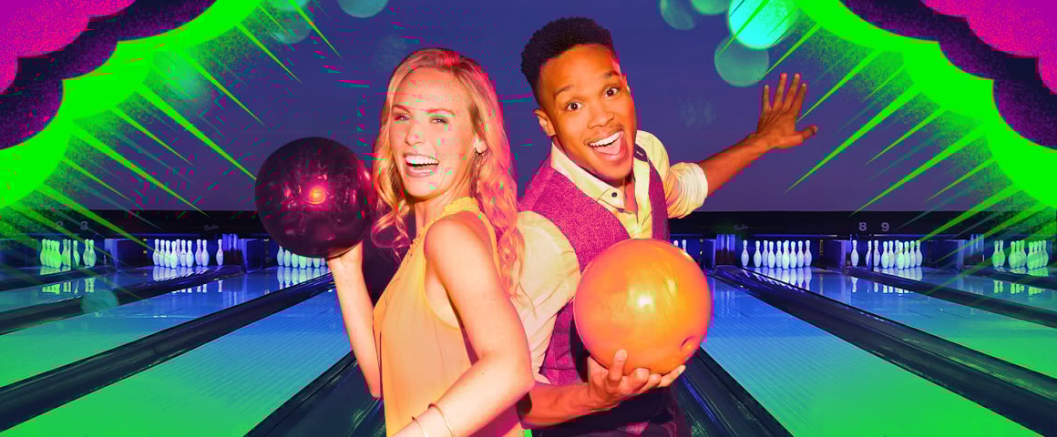 Bowlers having fun while night bowling