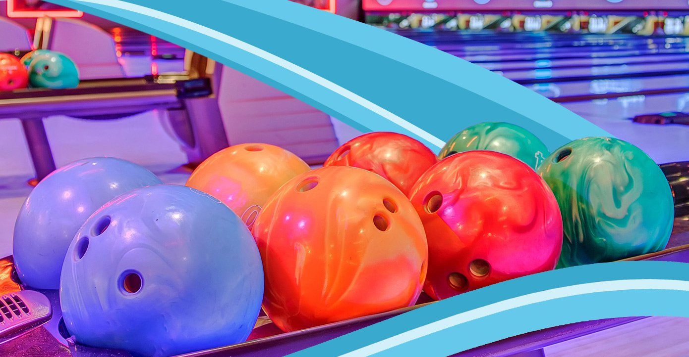 Colorful Bowling Balls Lined up on the Rack