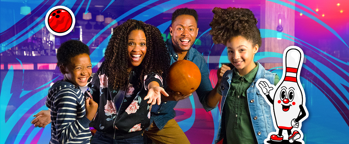 Family having fun bowling