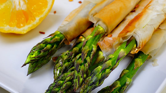 Filo wrapped asparagus on a plate