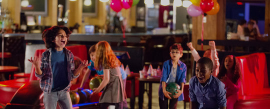 Kids having fun bowling