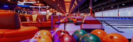 bowling balls with lanes in background