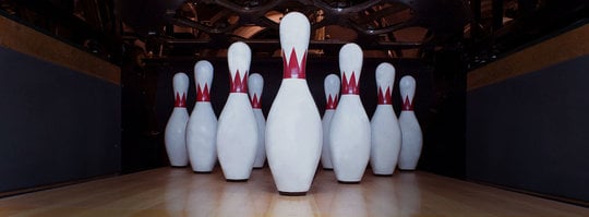 bowling pins arranged in a triangle