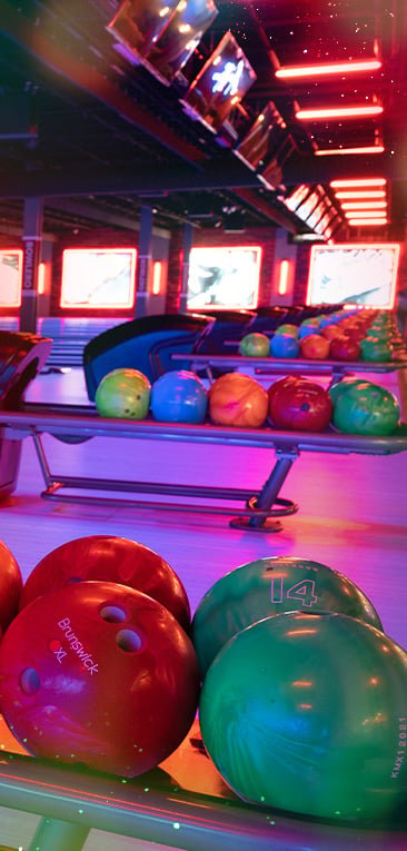 bowling balls with neon lights