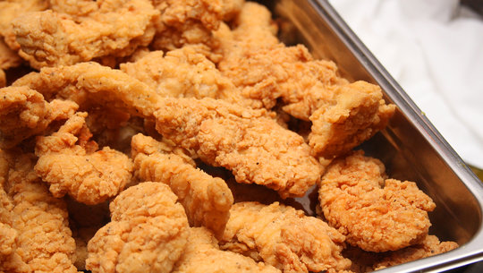 Platter of chicken tenders in a tray