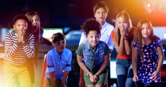 Kids excited and looking down lanes