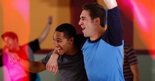 Two league bowlers cheering
