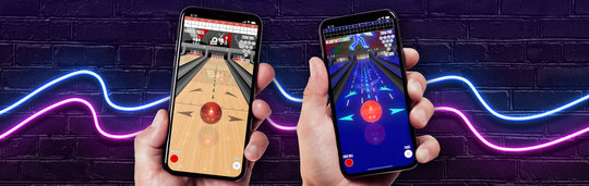 Strike by Bowlero mobile game being held up by two players