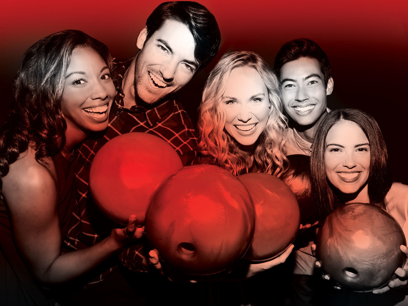 5 bowlers holding up bowling balls and smiling