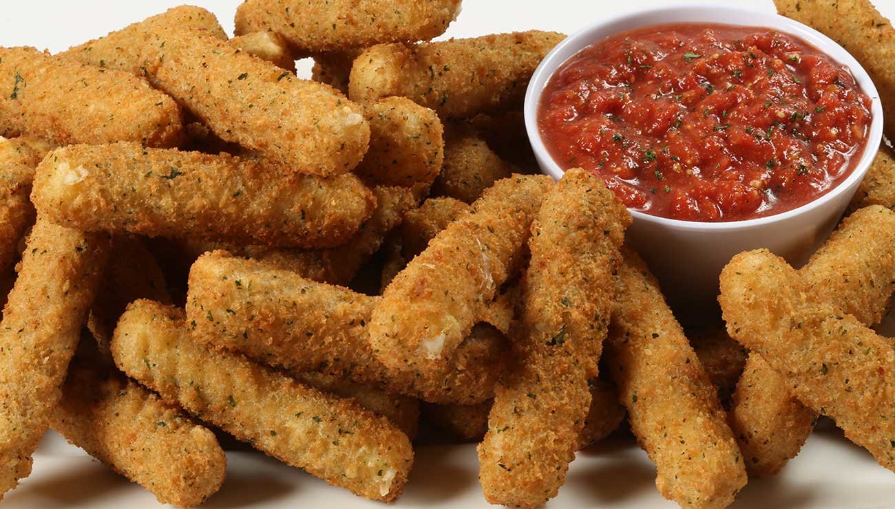 pile of mozzarella sticks and marinara dipping sauce